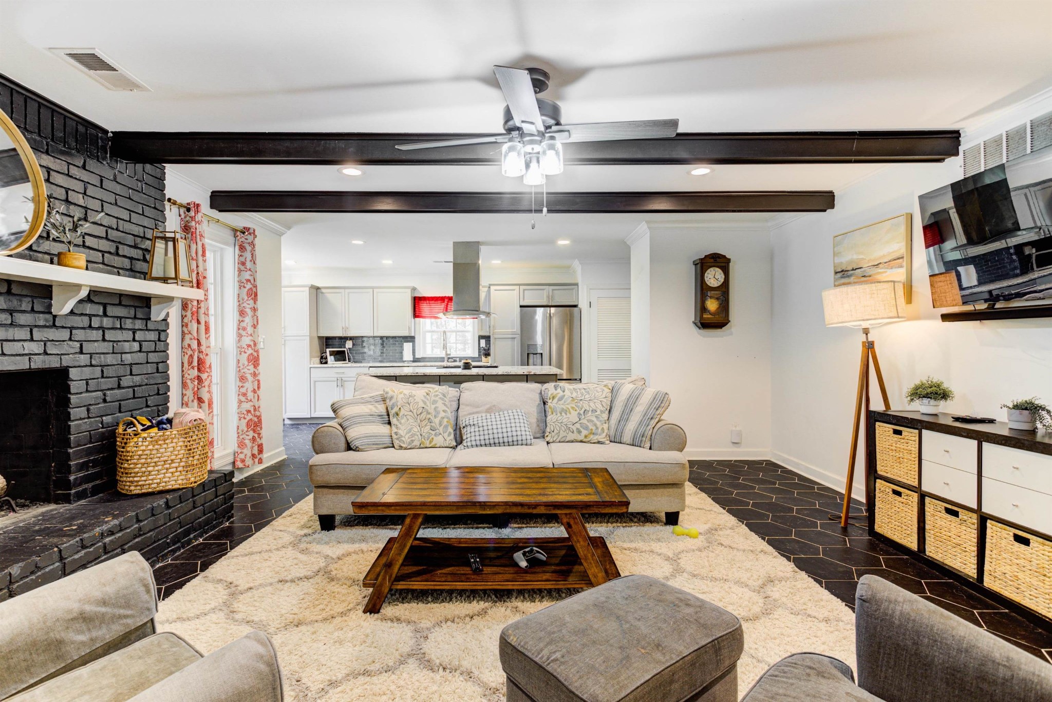 8929 Rocky Point Road Cordova, TN 38018 - Photo 7 of 37 a living room with furniture and a flat screen tv