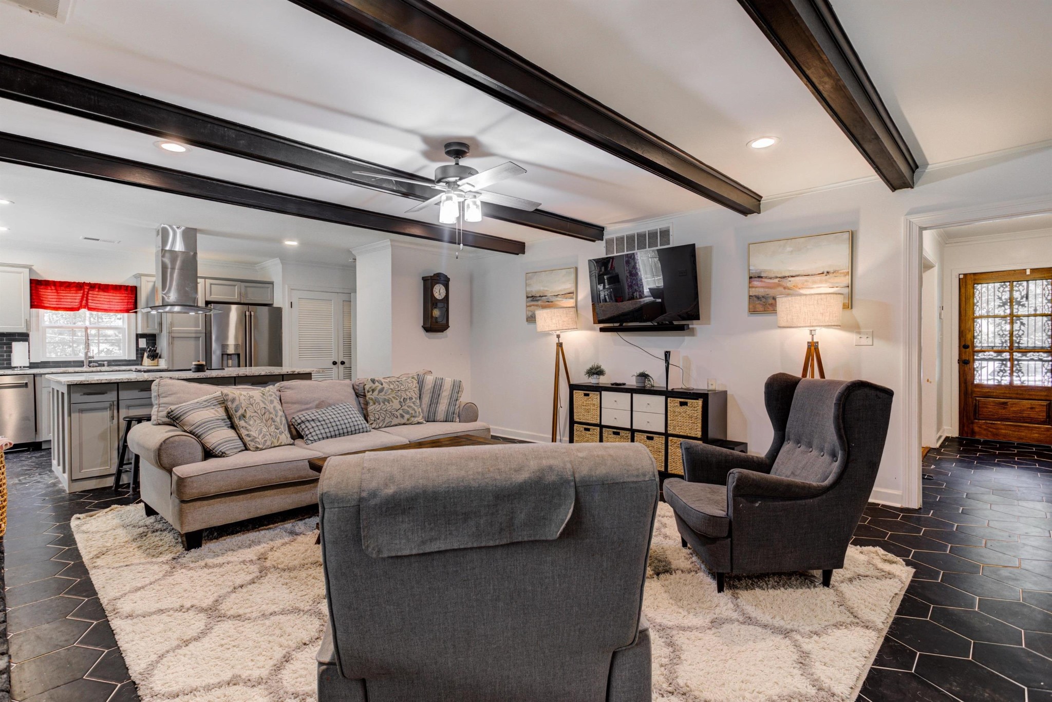 8929 Rocky Point Road Cordova, TN 38018 - Photo 8 of 37 a living room with furniture and a flat screen tv