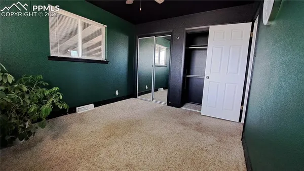 a view of a hallway with entryway