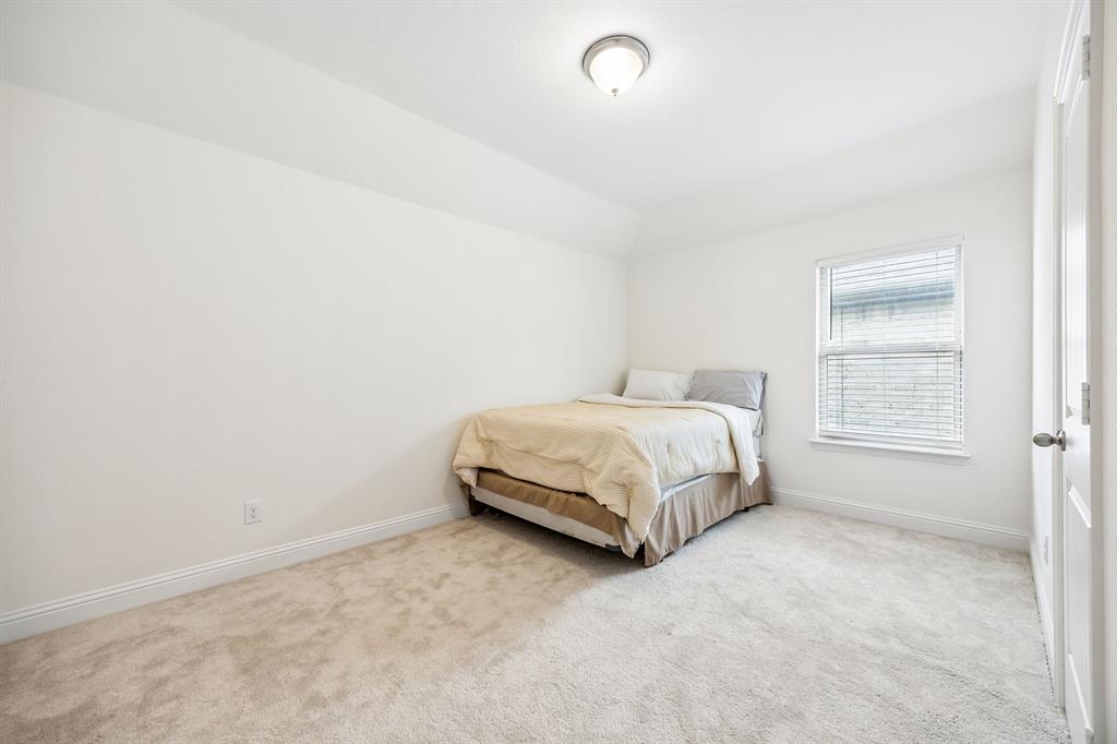 11732 Wulstone Road Fort Worth, TX 76052 - Photo 19 of 34 Carpeted room featuring a single window with blinds, white walls, and a semi-flush mount ceiling light fixture