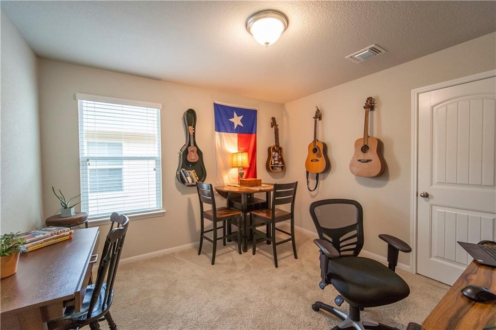 10406 Hatton Lane Austin, TX 78754 - Photo 13 of 22 a view of a livingroom with furniture and a window