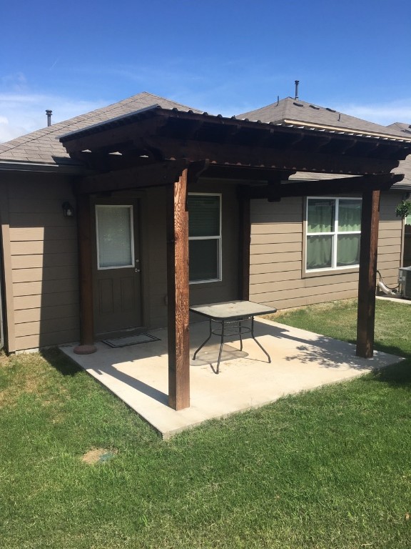 10406 Hatton Lane Austin, TX 78754 - Photo 17 of 22 a view of house with backyard and furniture