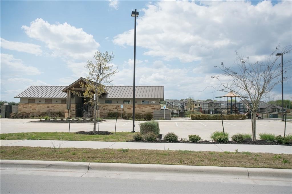 10406 Hatton Lane Austin, TX 78754 - Photo 20 of 22 a view of a fountain in front of a building