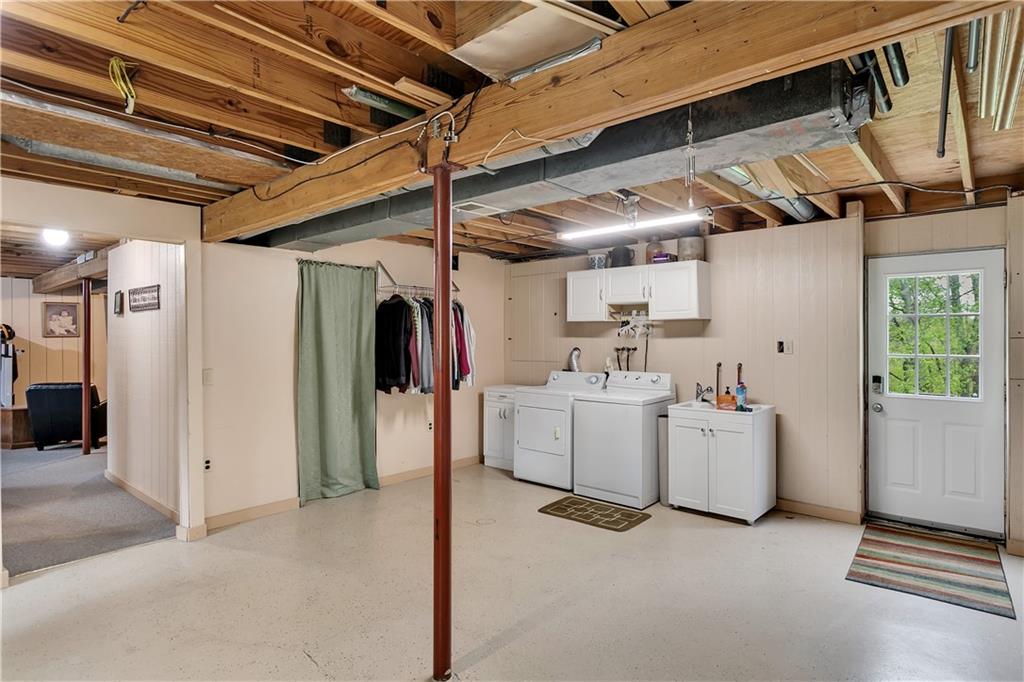 227 Brewer Road Freedom, PA 15042 - Photo 23 of 34 a view of a storage & utility room with closet dryer and washer