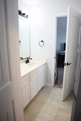 a bathroom with a toilet and a bathtub