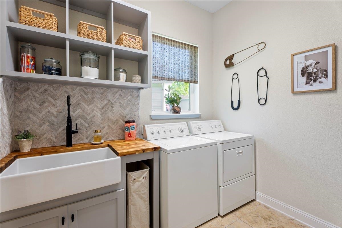 145 Paranza Trace St. Augustine, FL 32095 - Photo 18 of 34 a utility room with dryer and washer