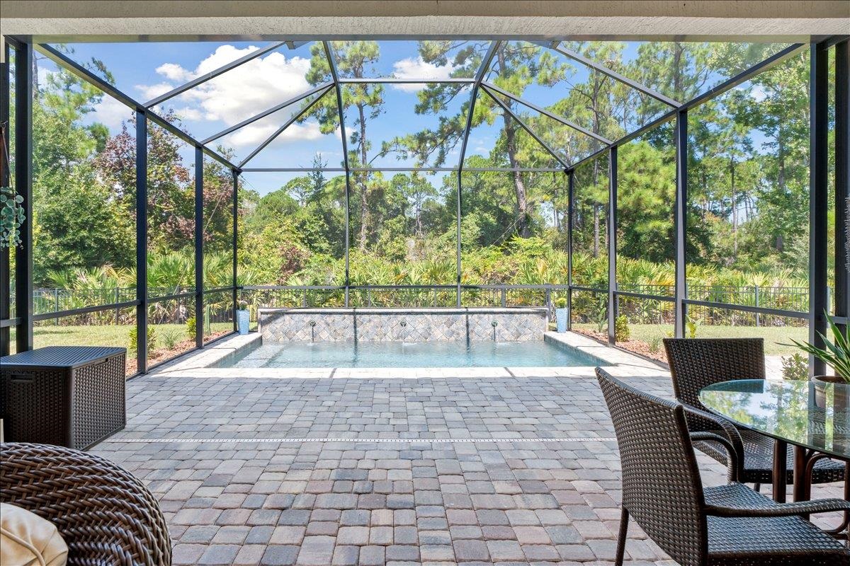 145 Paranza Trace St. Augustine, FL 32095 - Photo 20 of 34 a view of a living room and balcony