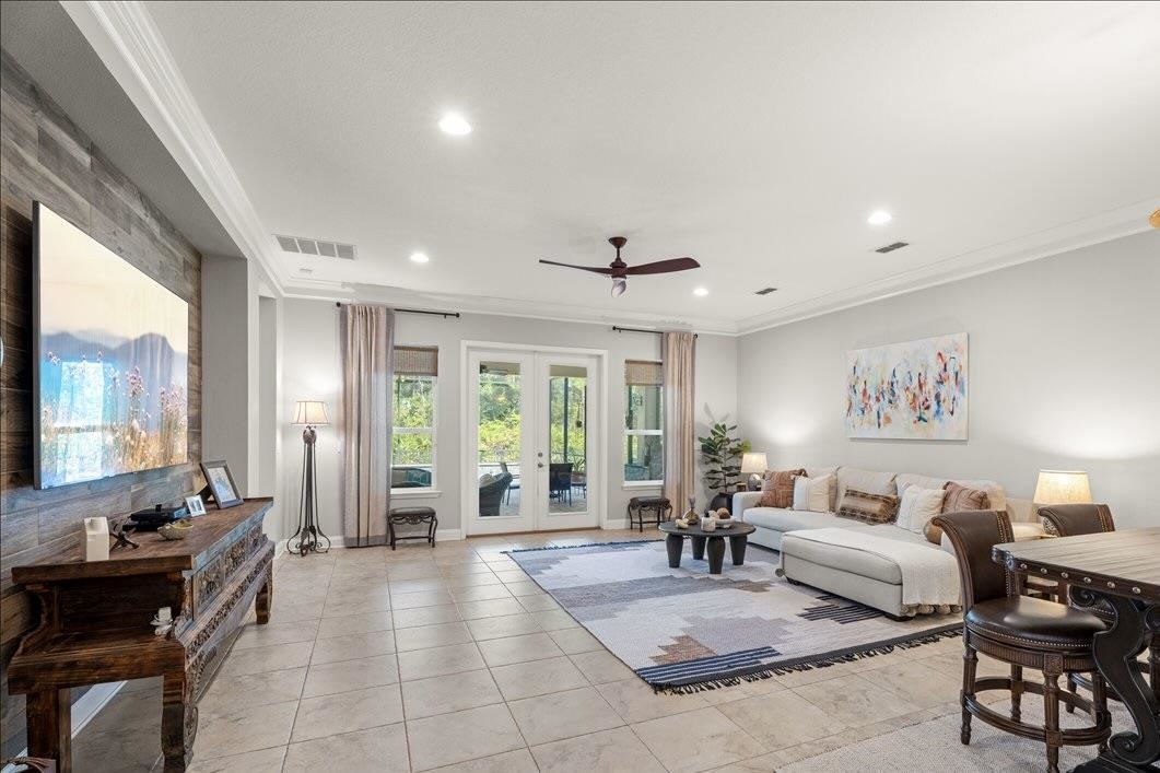 145 Paranza Trace St. Augustine, FL 32095 - Photo 5 of 34 a living room with furniture and a large window