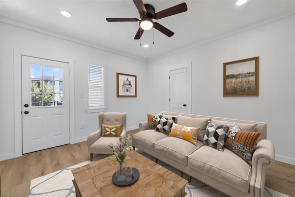 a living room with furniture and a window