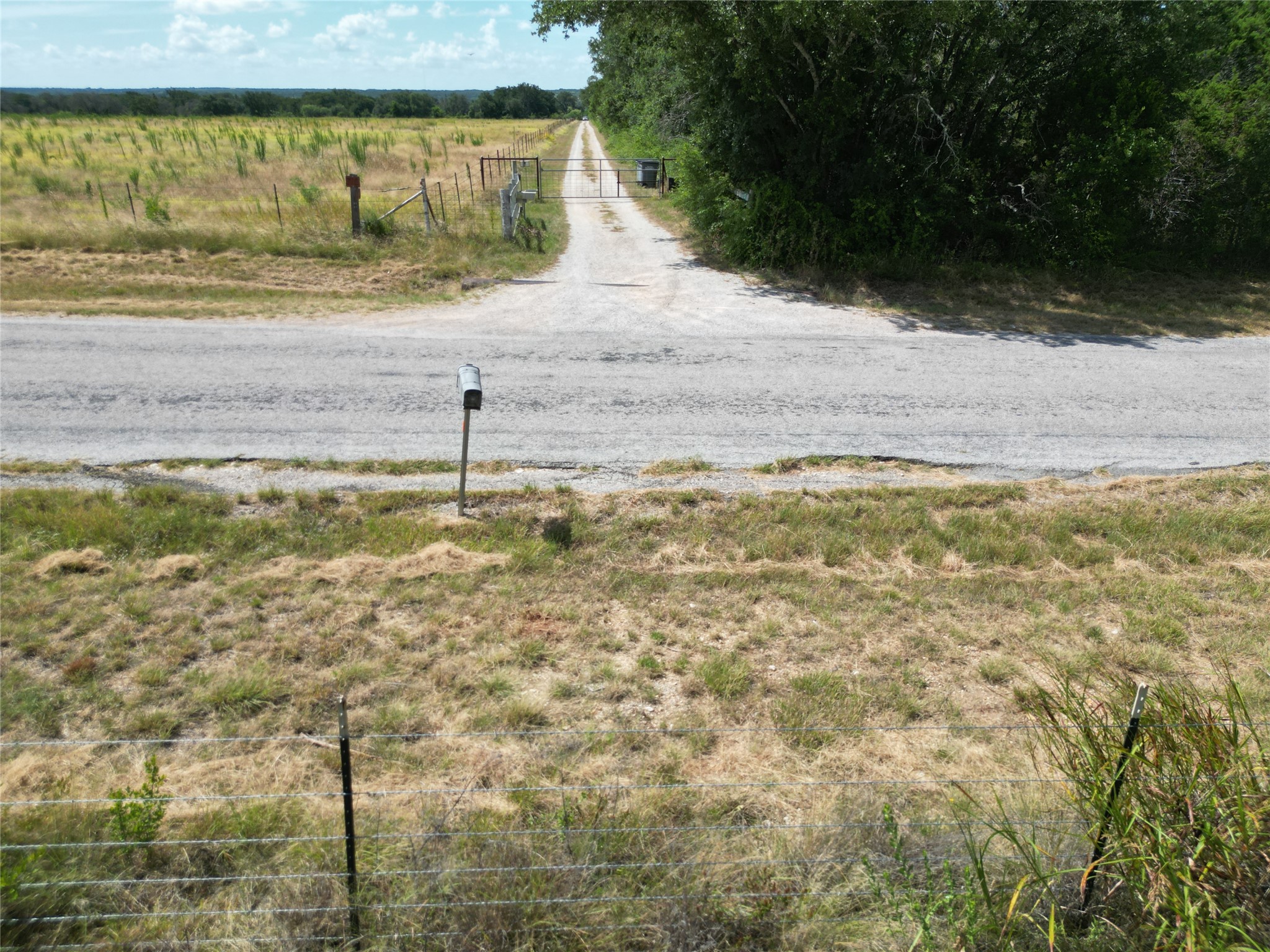200/ Shady Grove Road Bertram, TX 78605 - Photo 3 of 17 Front gate at the easement road.
