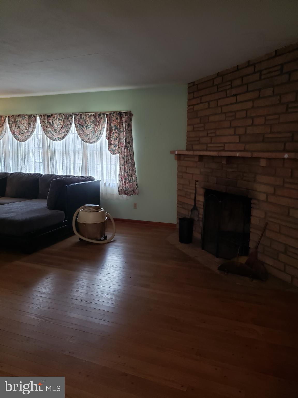 270 Barnes Corner Road Rising Sun, MD 21911 - Photo 15 of 34 a living room with furniture and a fireplace