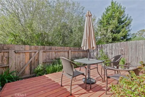 a view of a table and chairs in patio