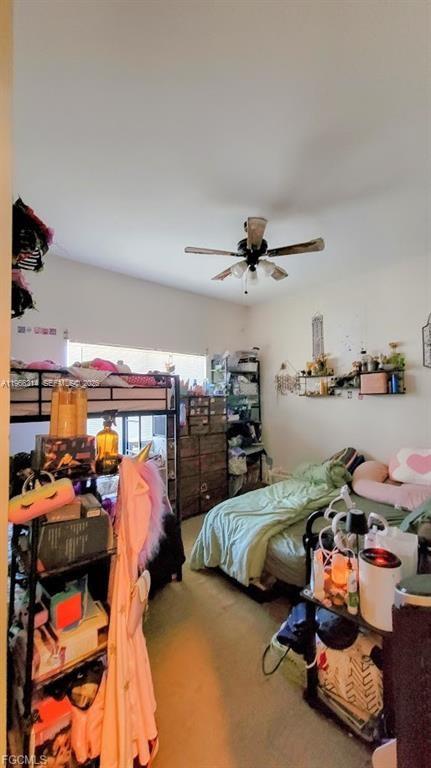 4529 Springview Circle LaBelle, FL 33935 - Photo 10 of 11 a bedroom with furniture and a fan
