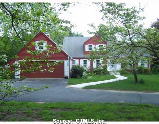 148 Mullen Hill Road Windham, CT 06280 - Photo 1 of 1 a house view with a garden