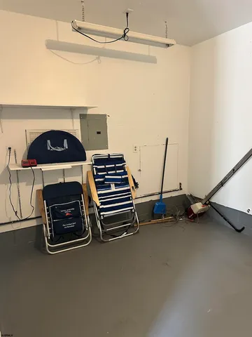 a view of an empty room with furniture