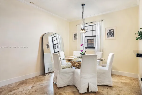 a view of a dining room with furniture