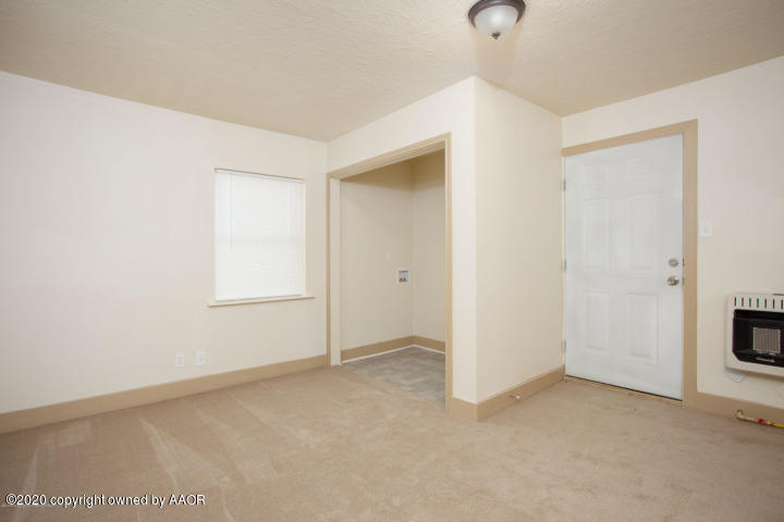 510 Southwest 45th Avenue Amarillo, TX 79110 - Photo 5 of 7 a view of an empty room with a window