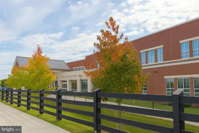 a view of house with balcony
