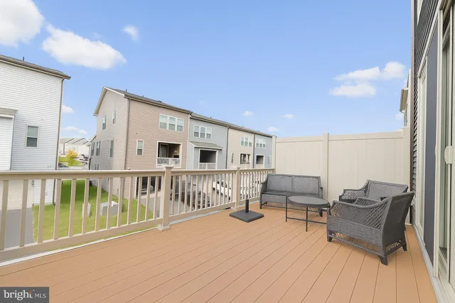 a view of balcony with furniture