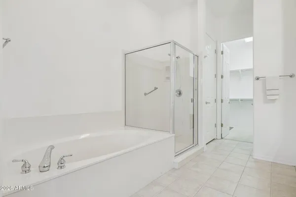 a bathroom with a sink double vanity and a mirror