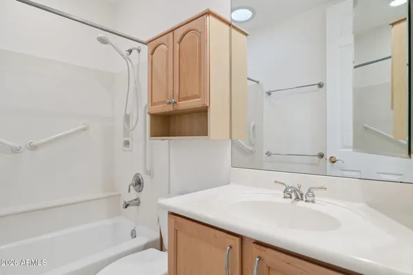 a bathroom with a sink a toilet and a bathtub