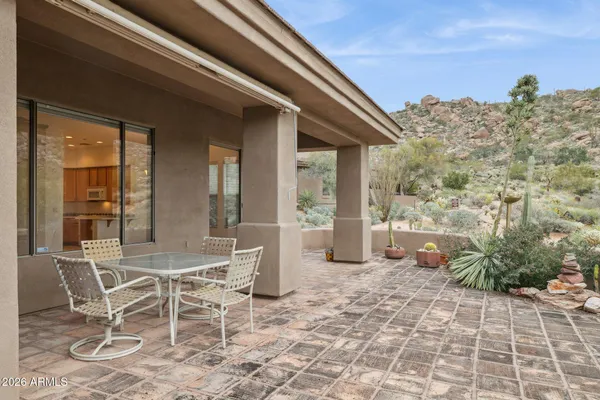 a utility room with sink dryer and washer