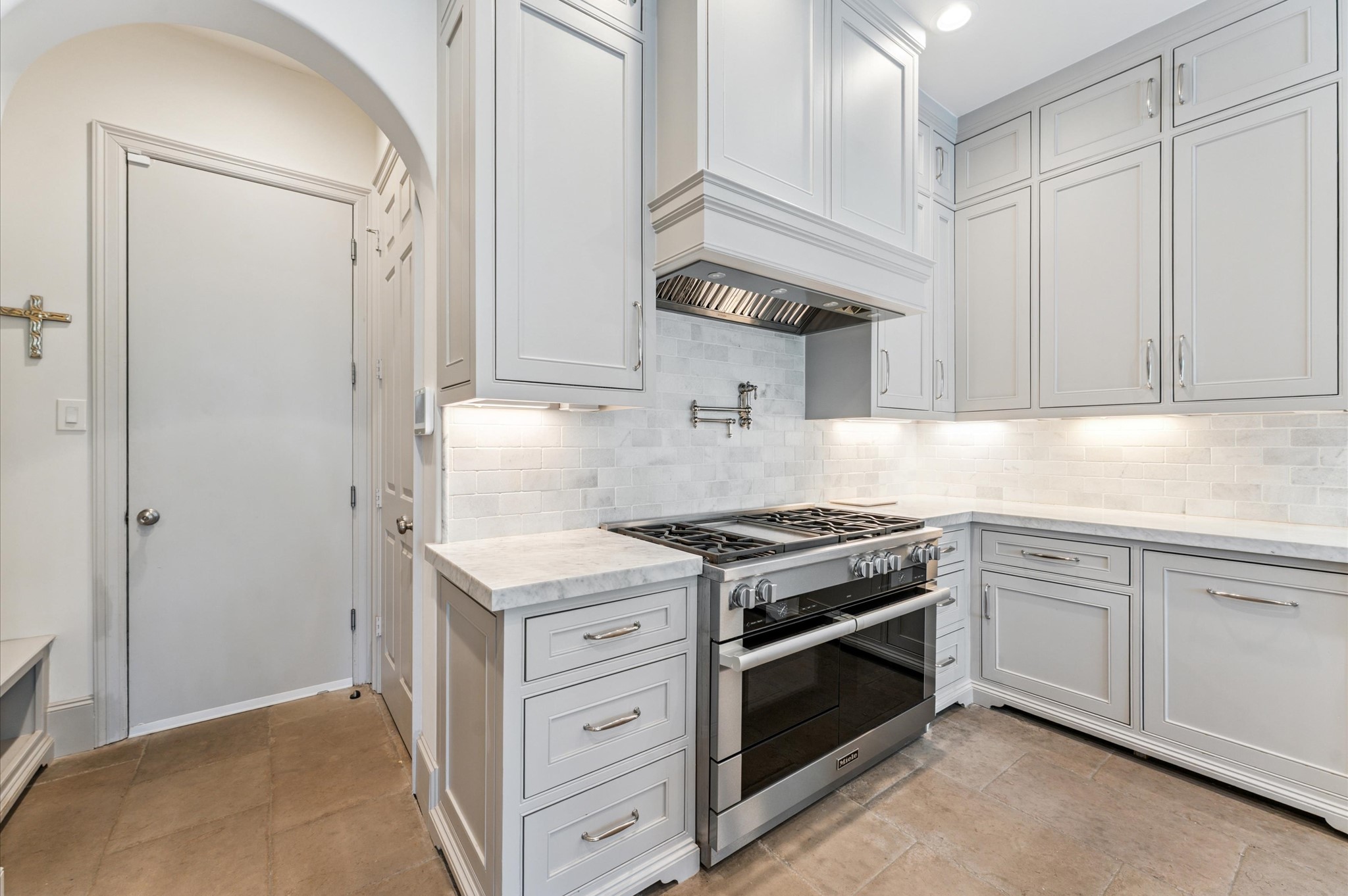 7 Marilane Street Houston, TX 77007 - Photo 13 of 45 a kitchen with a stove and a sink