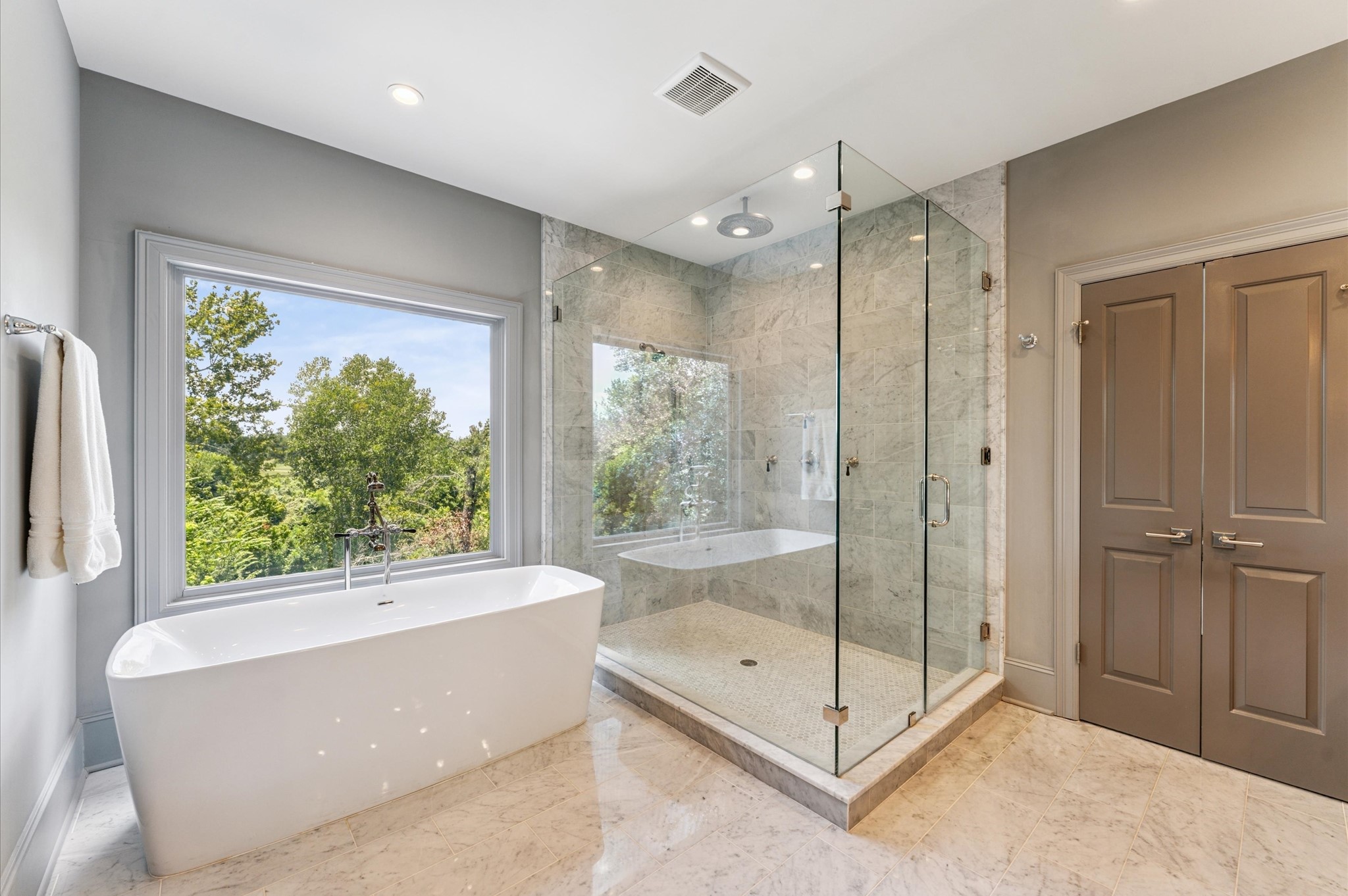 7 Marilane Street Houston, TX 77007 - Photo 24 of 45 a bathroom with a tub shower and sink
