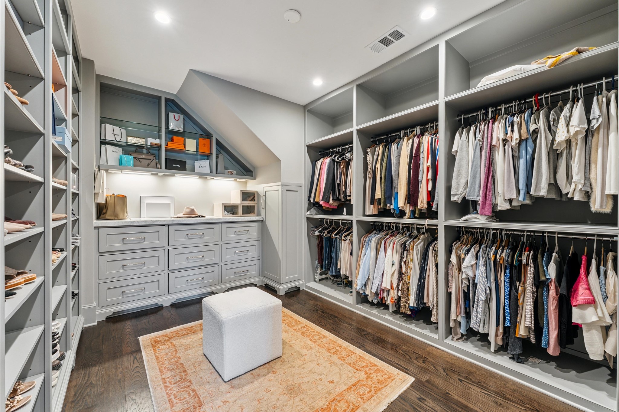7 Marilane Street Houston, TX 77007 - Photo 26 of 45 a view of walk in closet with clothes and shoes