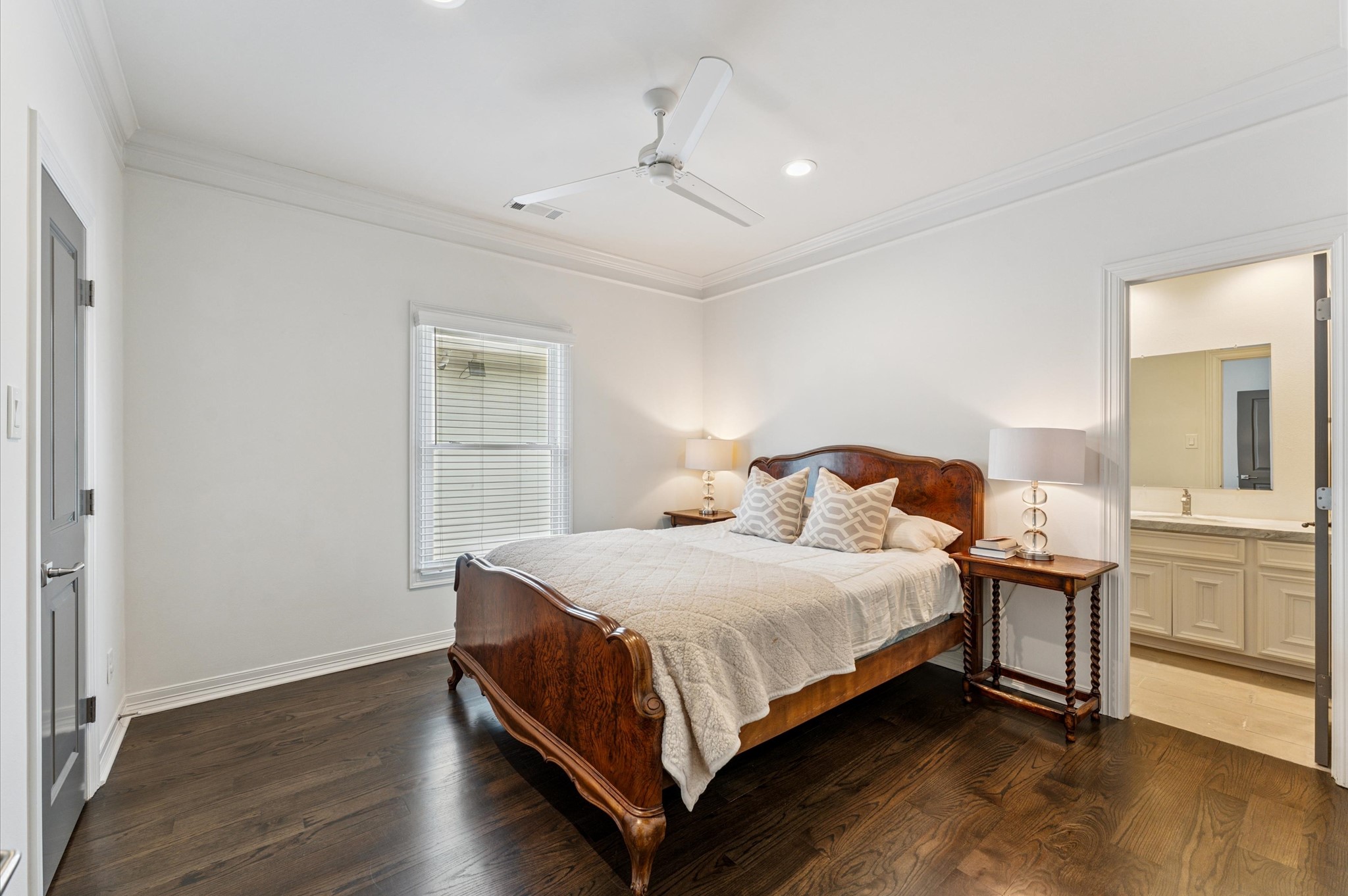 7 Marilane Street Houston, TX 77007 - Photo 27 of 45 a bedroom with a bed and cabinet