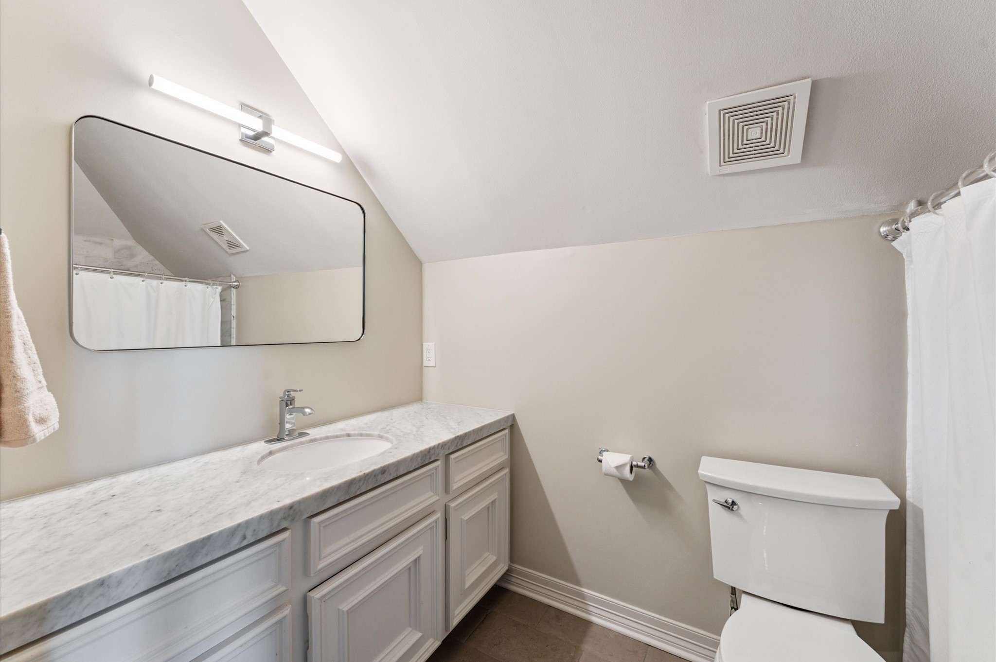 7 Marilane Street Houston, TX 77007 - Photo 34 of 45 a bathroom with a granite countertop sink mirror and toilet