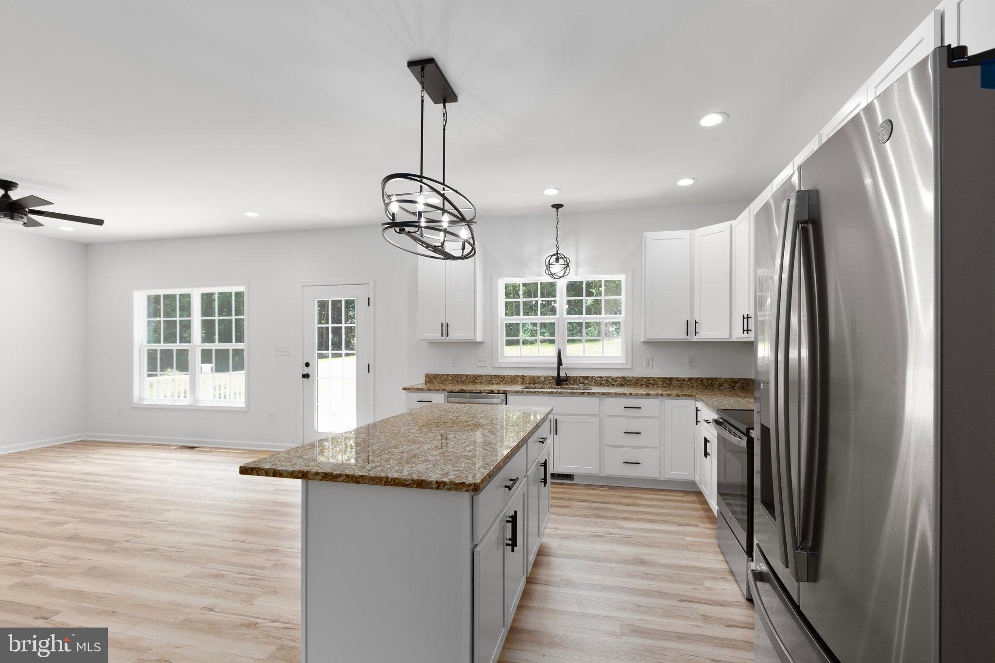 2180 Woodson Hollow Road Beaverdam, VA 23015 - Photo 13 of 32 Bright and airy modern kitchen space.