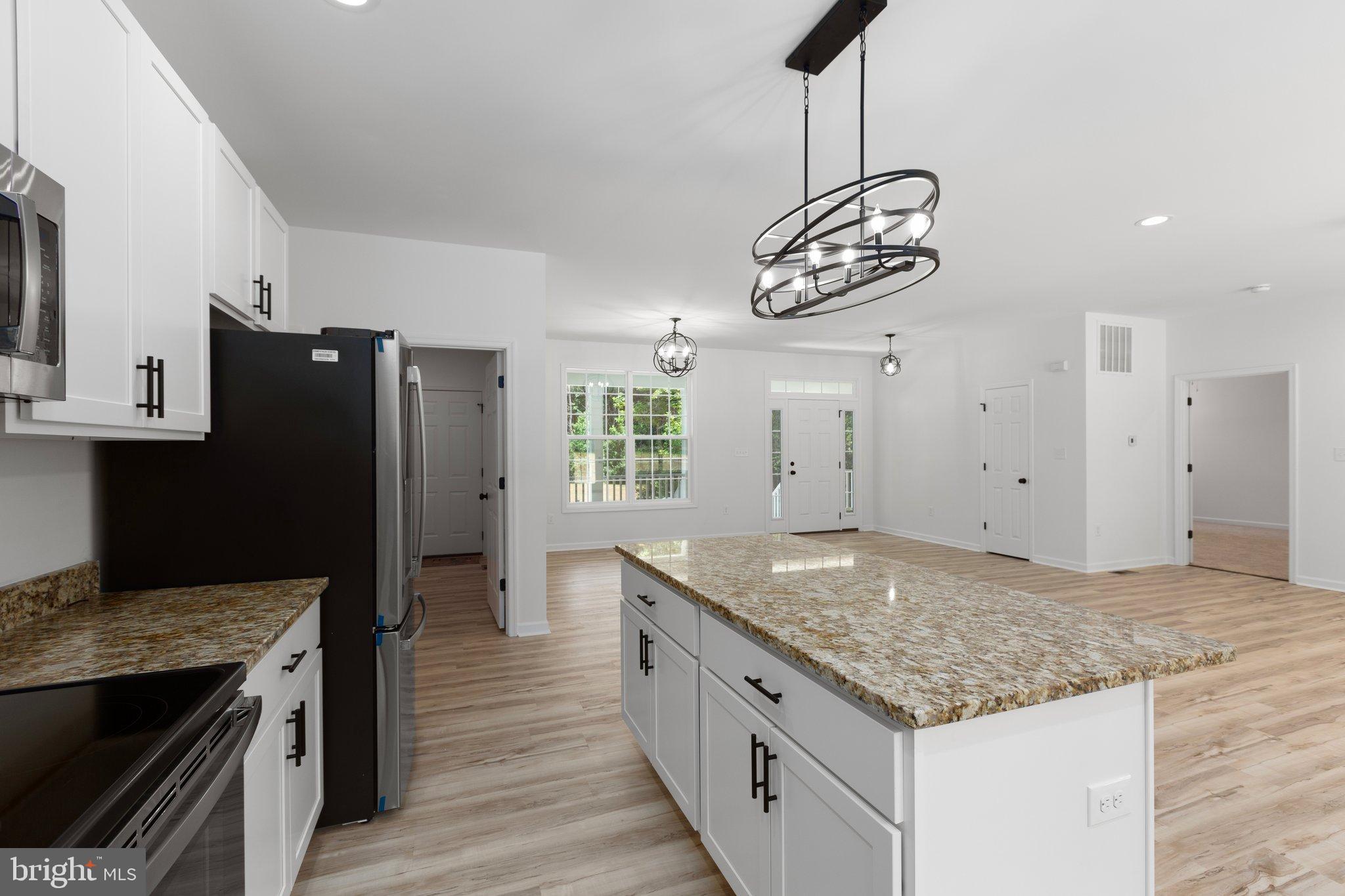 2180 Woodson Hollow Road Beaverdam, VA 23015 - Photo 14 of 32 Bright, modern kitchen with open layout.