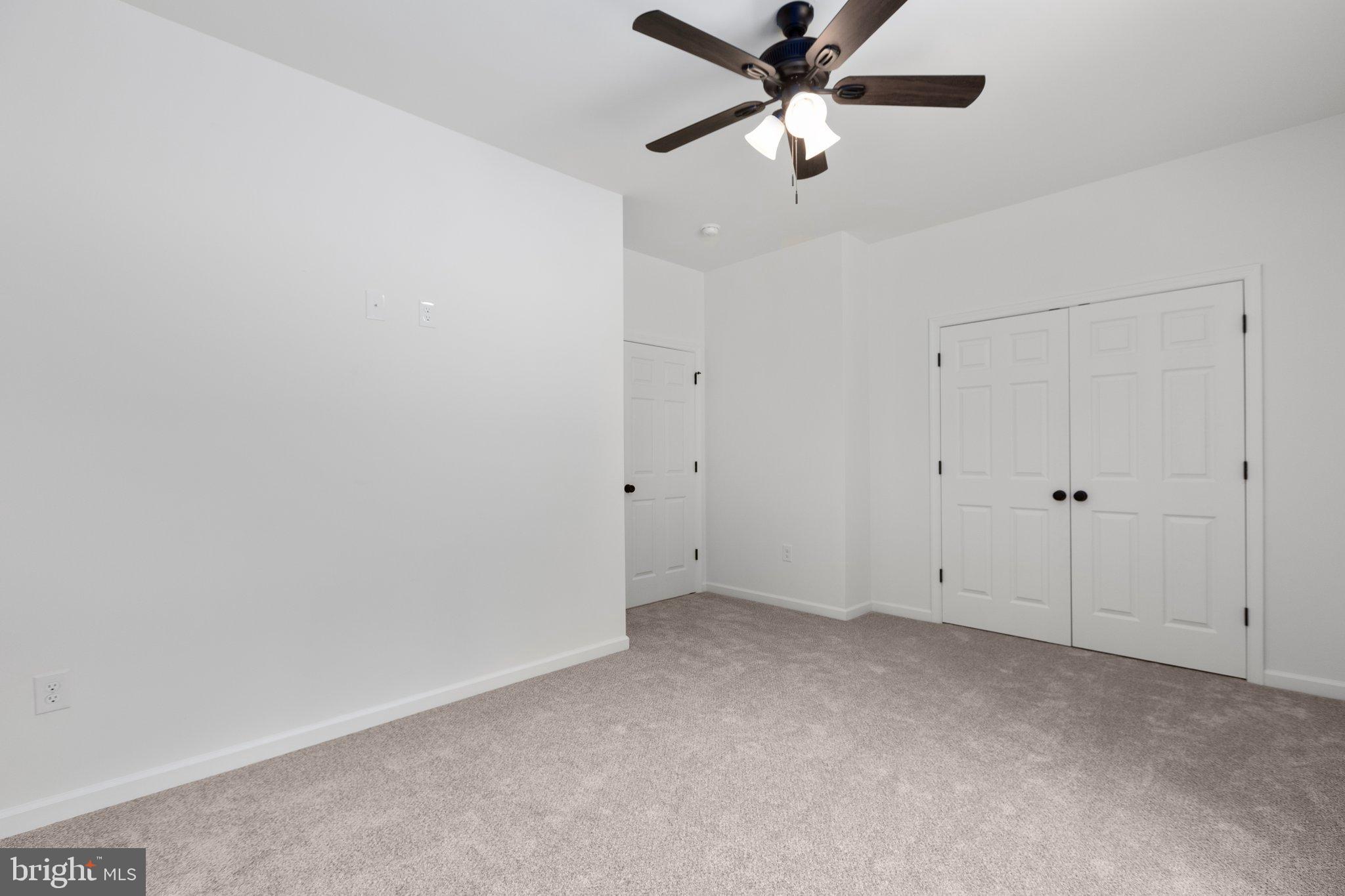 2180 Woodson Hollow Road Beaverdam, VA 23015 - Photo 16 of 32 Spacious room with modern ceiling fan.