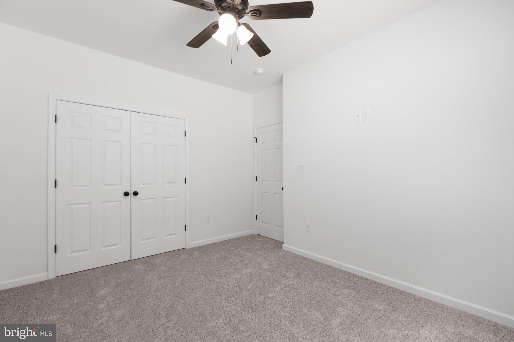 2180 Woodson Hollow Road Beaverdam, VA 23015 - Photo 19 of 32 Spacious room with modern ceiling fan.