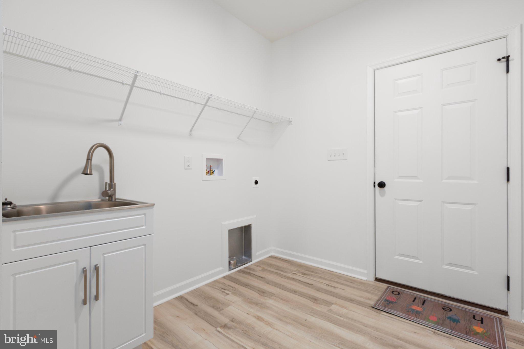 2180 Woodson Hollow Road Beaverdam, VA 23015 - Photo 23 of 32 Bright and functional laundry space awaits.