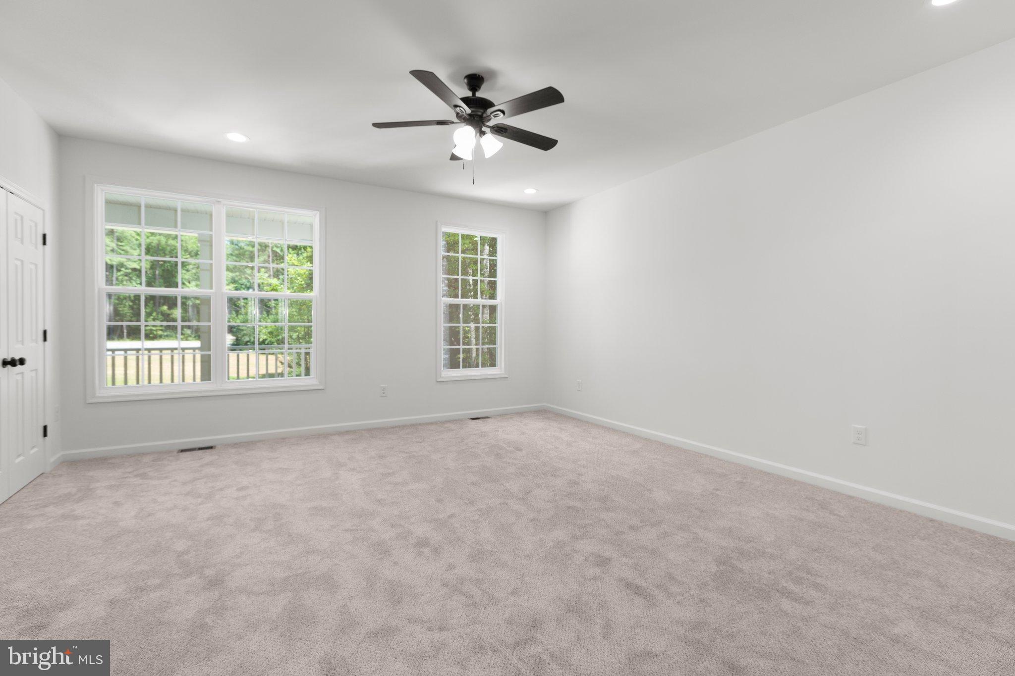 2180 Woodson Hollow Road Beaverdam, VA 23015 - Photo 24 of 32 Bright and airy primary suite with natural light.
