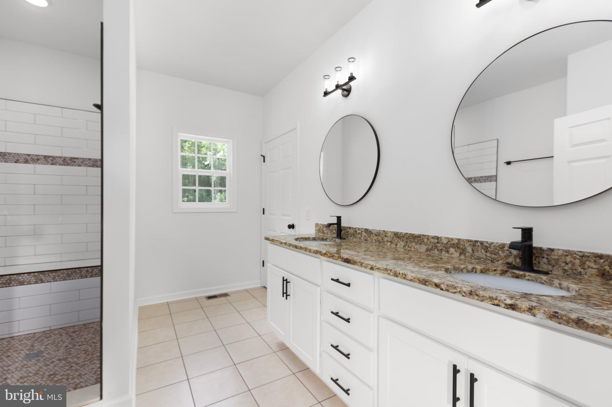 2180 Woodson Hollow Road Beaverdam, VA 23015 - Photo 29 of 32 Sleek modern primary bathroom