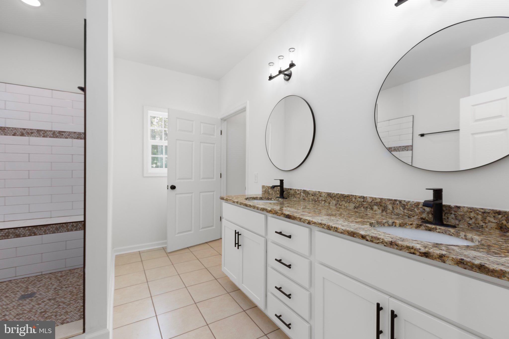 2180 Woodson Hollow Road Beaverdam, VA 23015 - Photo 30 of 32 Modern bathroom with elegant finishes.