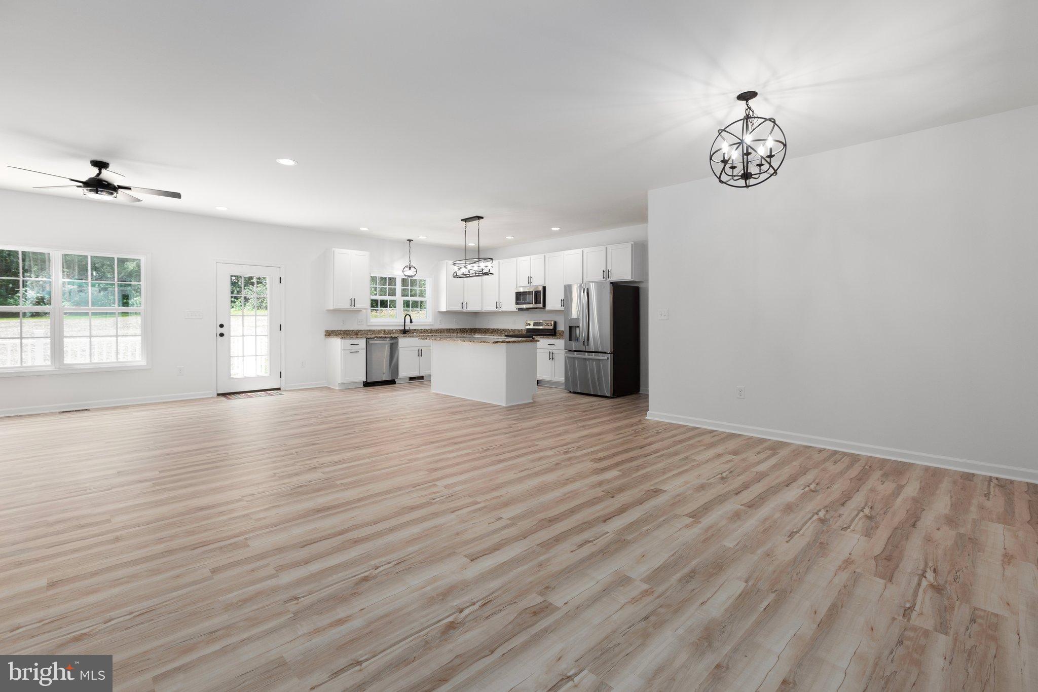2180 Woodson Hollow Road Beaverdam, VA 23015 - Photo 5 of 32 Spacious, modern open-concept living area.