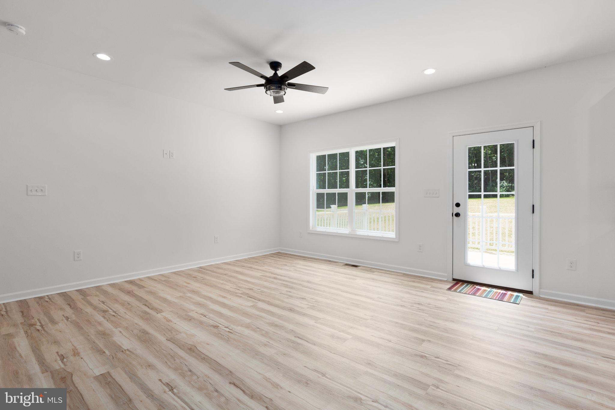 2180 Woodson Hollow Road Beaverdam, VA 23015 - Photo 9 of 32 Bright and airy living space with modern charm.