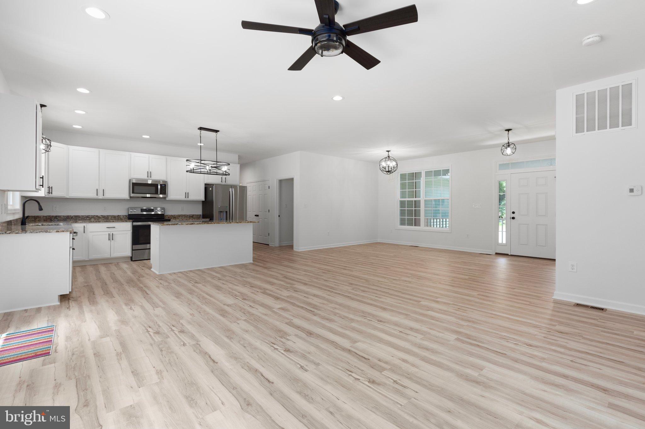 2180 Woodson Hollow Road Beaverdam, VA 23015 - Photo 10 of 32 Spacious, modern open-concept living area.