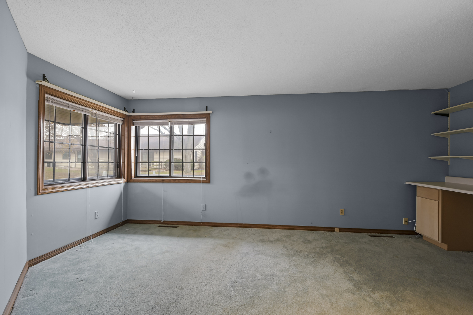 212 Spring Circle, Unit 212 Urbana, IL 61802 - Photo 11 of 22 an empty room with windows