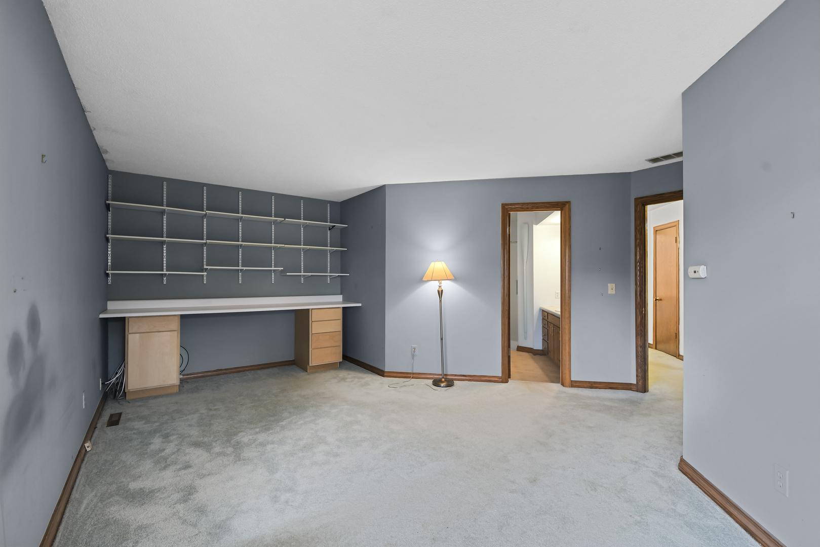 212 Spring Circle, Unit 212 Urbana, IL 61802 - Photo 12 of 22 a view of an empty room with a fireplace