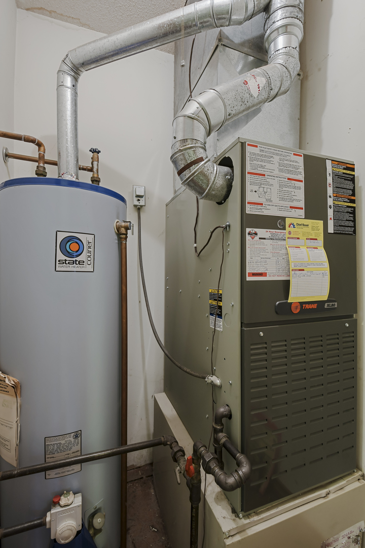 212 Spring Circle, Unit 212 Urbana, IL 61802 - Photo 15 of 22 a close view of water heater room