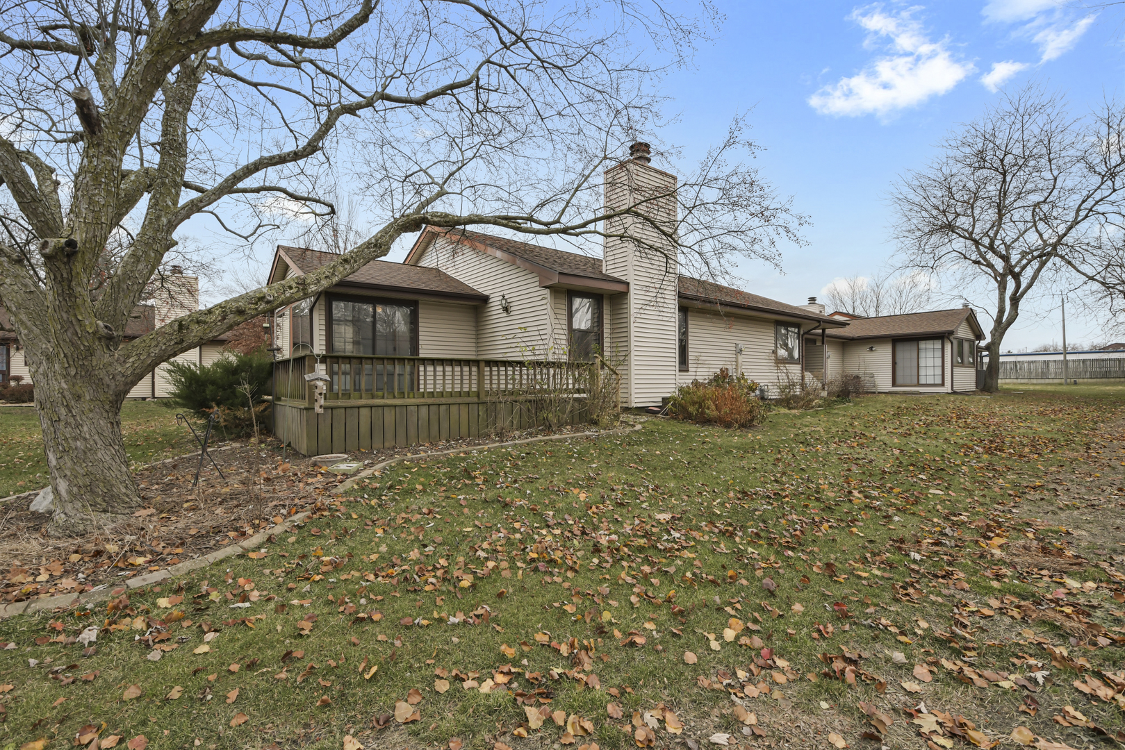 212 Spring Circle, Unit 212 Urbana, IL 61802 - Photo 16 of 22 a front view of a house with a garden