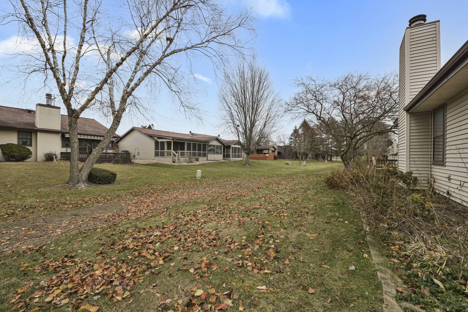 212 Spring Circle, Unit 212 Urbana, IL 61802 - Photo 17 of 22 a view of a house with a yard