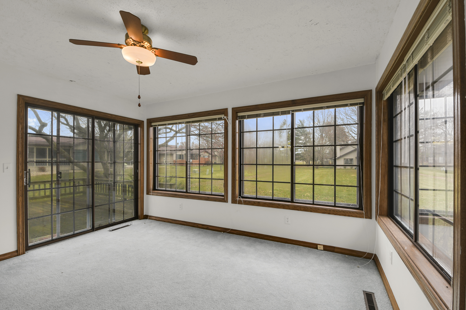 212 Spring Circle, Unit 212 Urbana, IL 61802 - Photo 8 of 22 a view of an empty room with a window