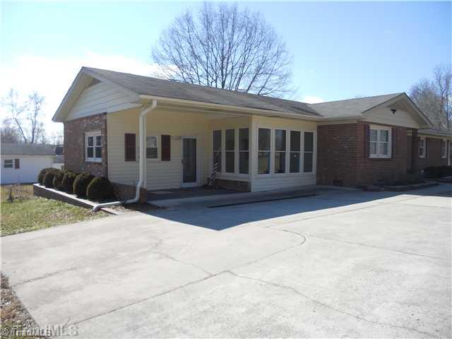 8465 Stafford Mill Road Oak Ridge, NC 27310 - Photo 2 of 16 Exterior Front.