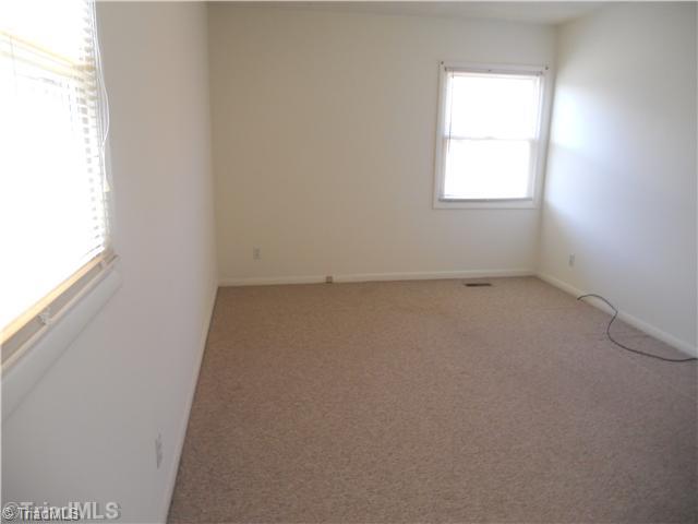 8465 Stafford Mill Road Oak Ridge, NC 27310 - Photo 10 of 16 Master Bedroom.
